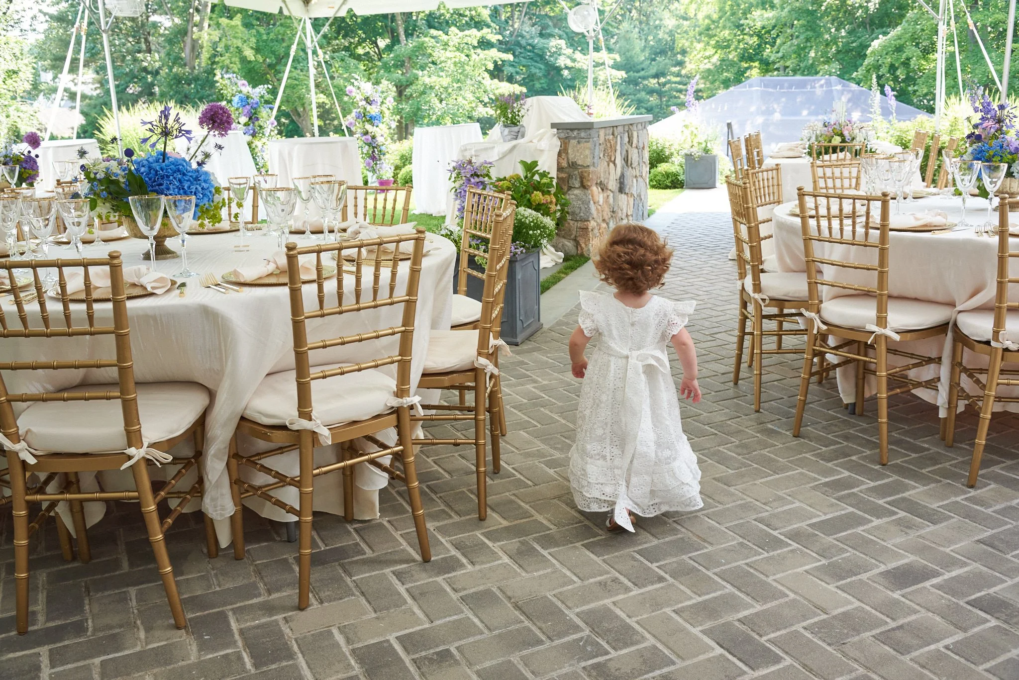 Flower girl at wedding in Westport, CT by event photographer Pamela Einarsen