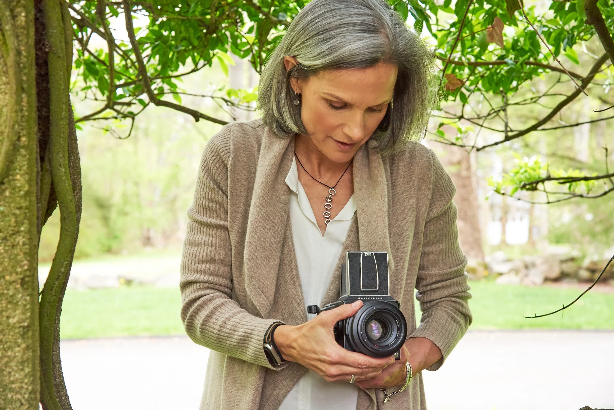 Photographer Torrance York uses her camera at a personal branding session at her New Canaan, CT home.