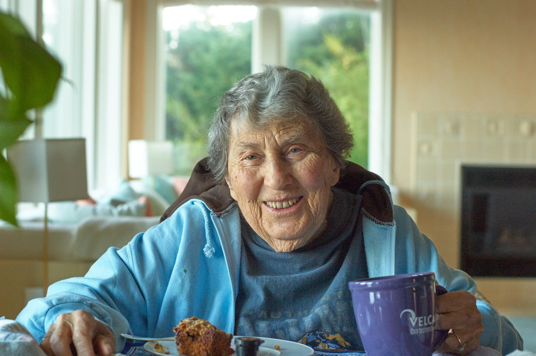 Grandmother portrait in her Michigan home at an extended family session with family photographer Pamela Einarsen.