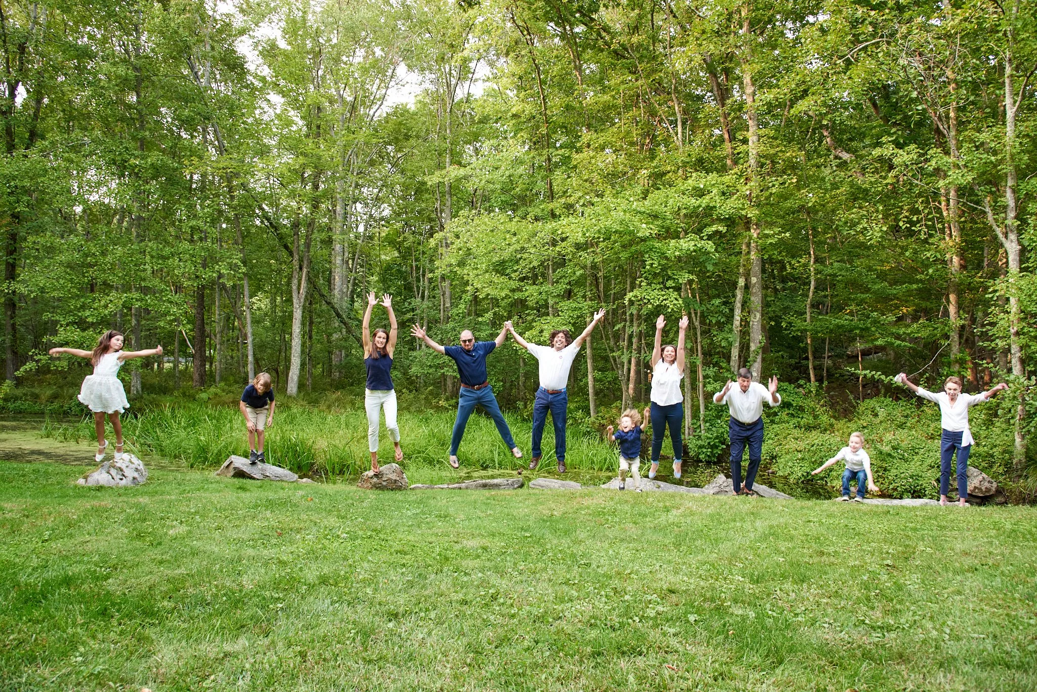 family jumps at Extended family reunion in Weston, CT with family photographer Pamela Einarsen. 