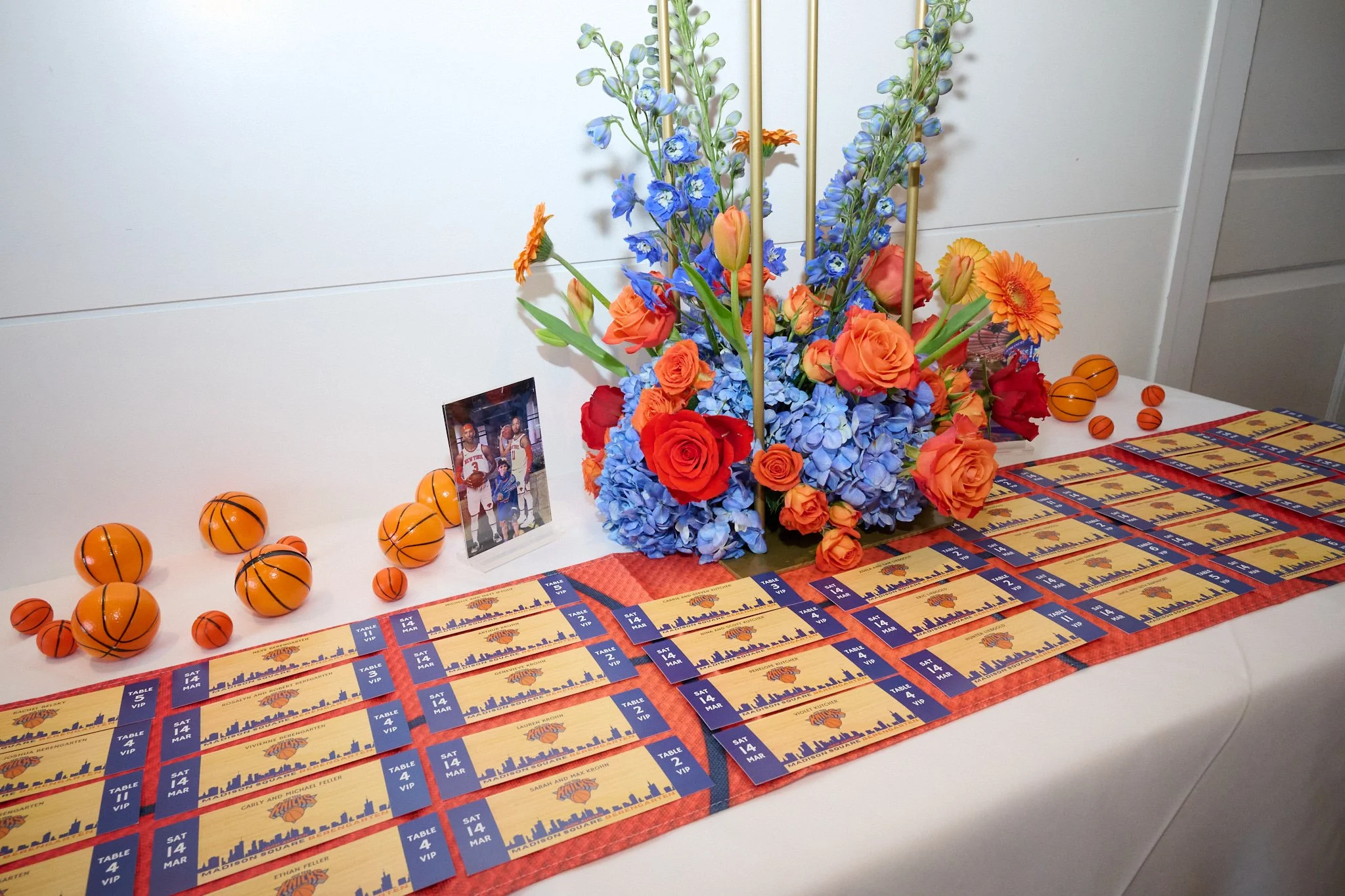 Bar Mitzvah party details of Knicks tickets as seating plan at The Boathouse Restaurant at The Rowing Club in Westport, CT by event photographer Pamela Einarsen.