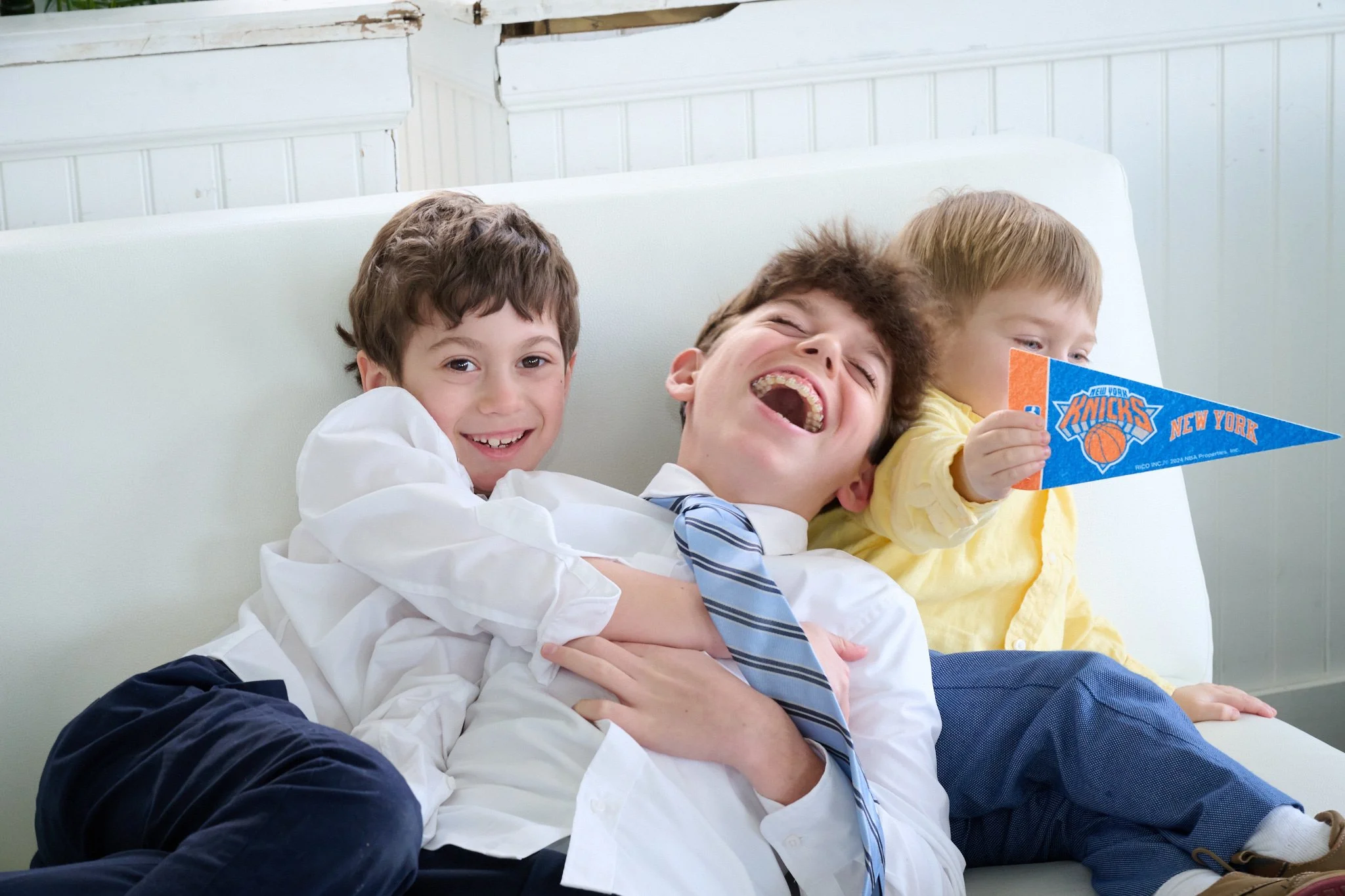 party guests laugh at the Boathouse Restaurant in Westport, CT by Bar Mitzvah photographer Pamela Einarsen. 