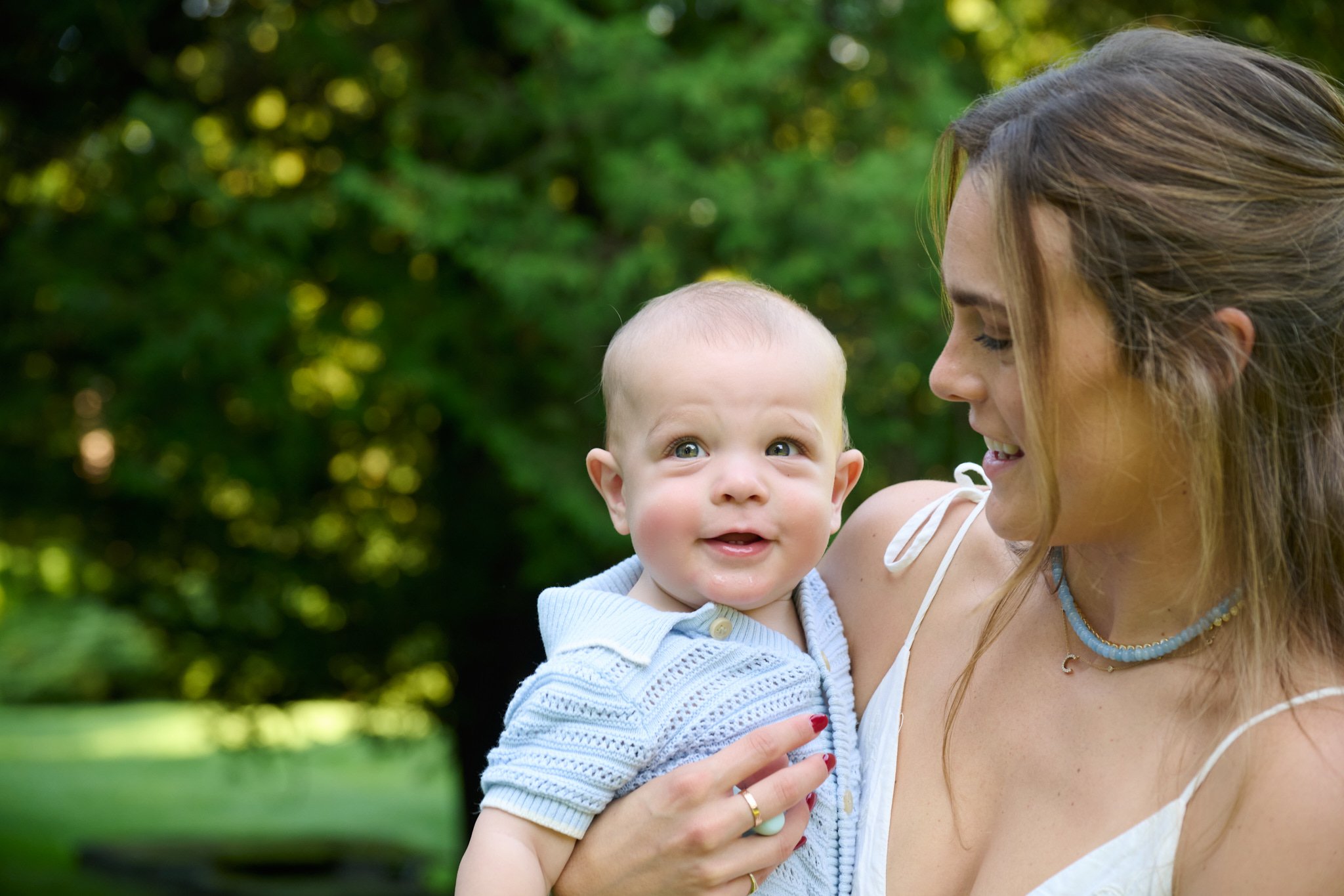 Mom smiles at her baby in Westport, CT with family photographer Pamela Einarsen. 