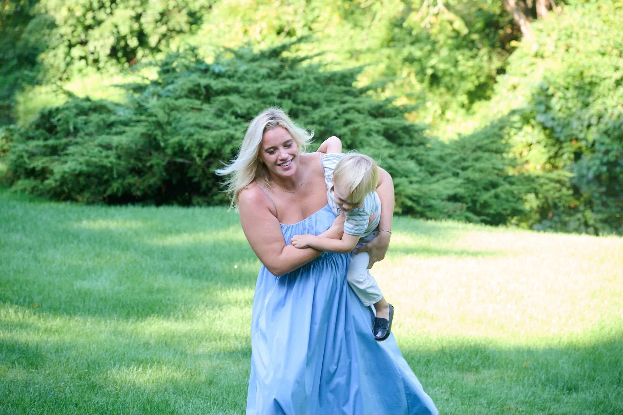 Aunt plays with her young nephew at Westport CT home by lifestyle photographer Pamela Einarsen.