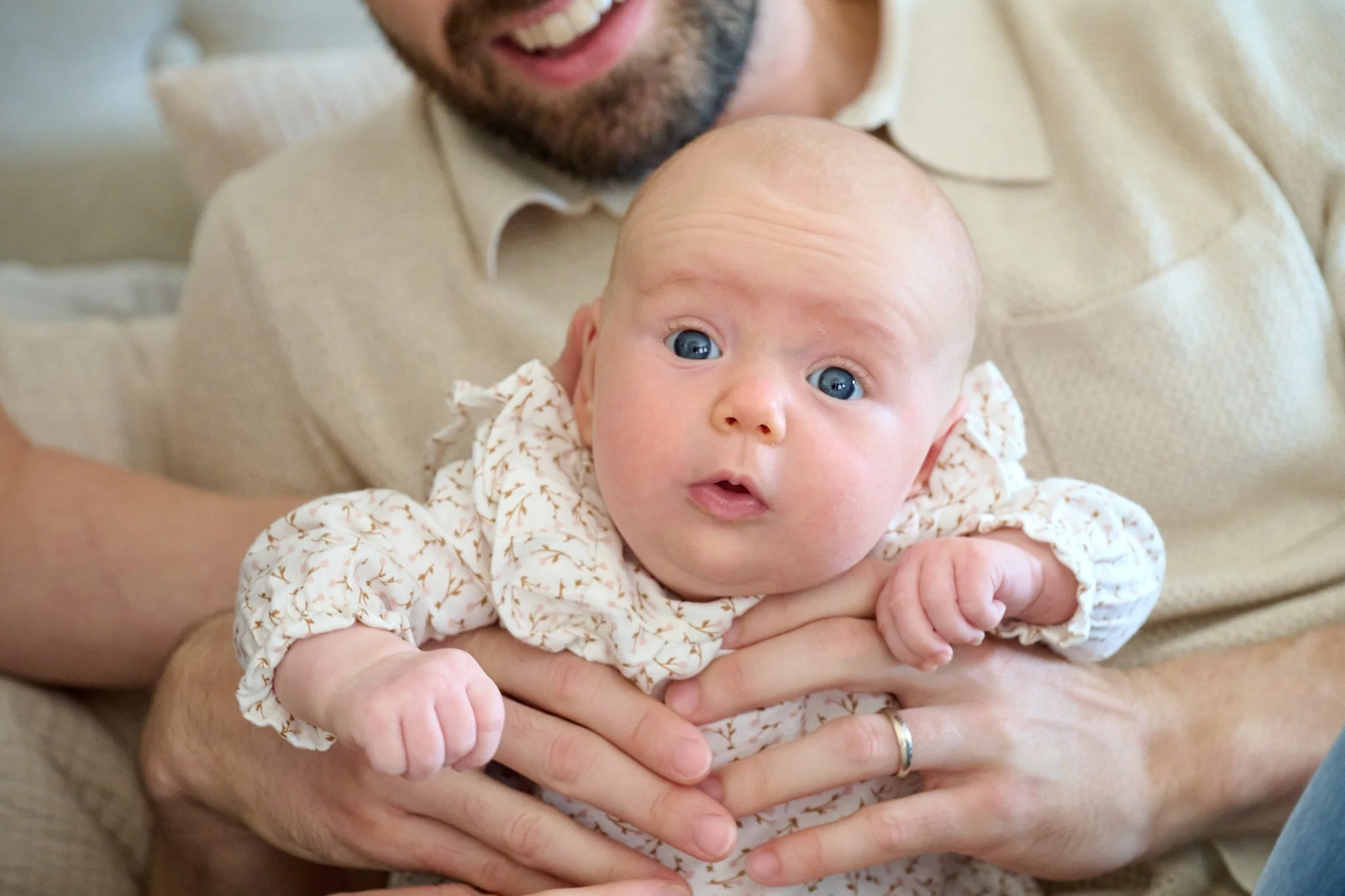 Portrait of newborn girl with dad in West Hartford, CT home by portrait photographer Pamela Einarsen. 