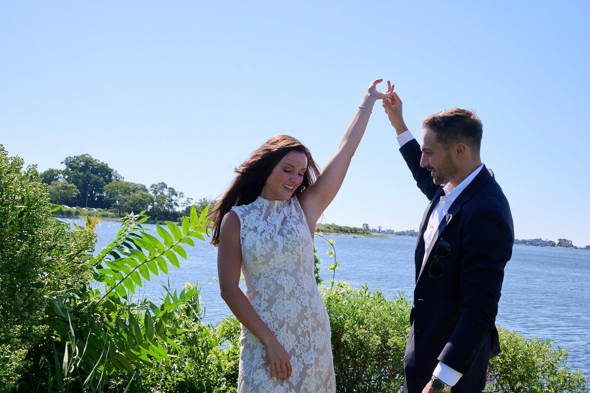 Bride and groom dance by the Long Island Sound in Westport CT with wedding photographer Pamela Einarsen. 