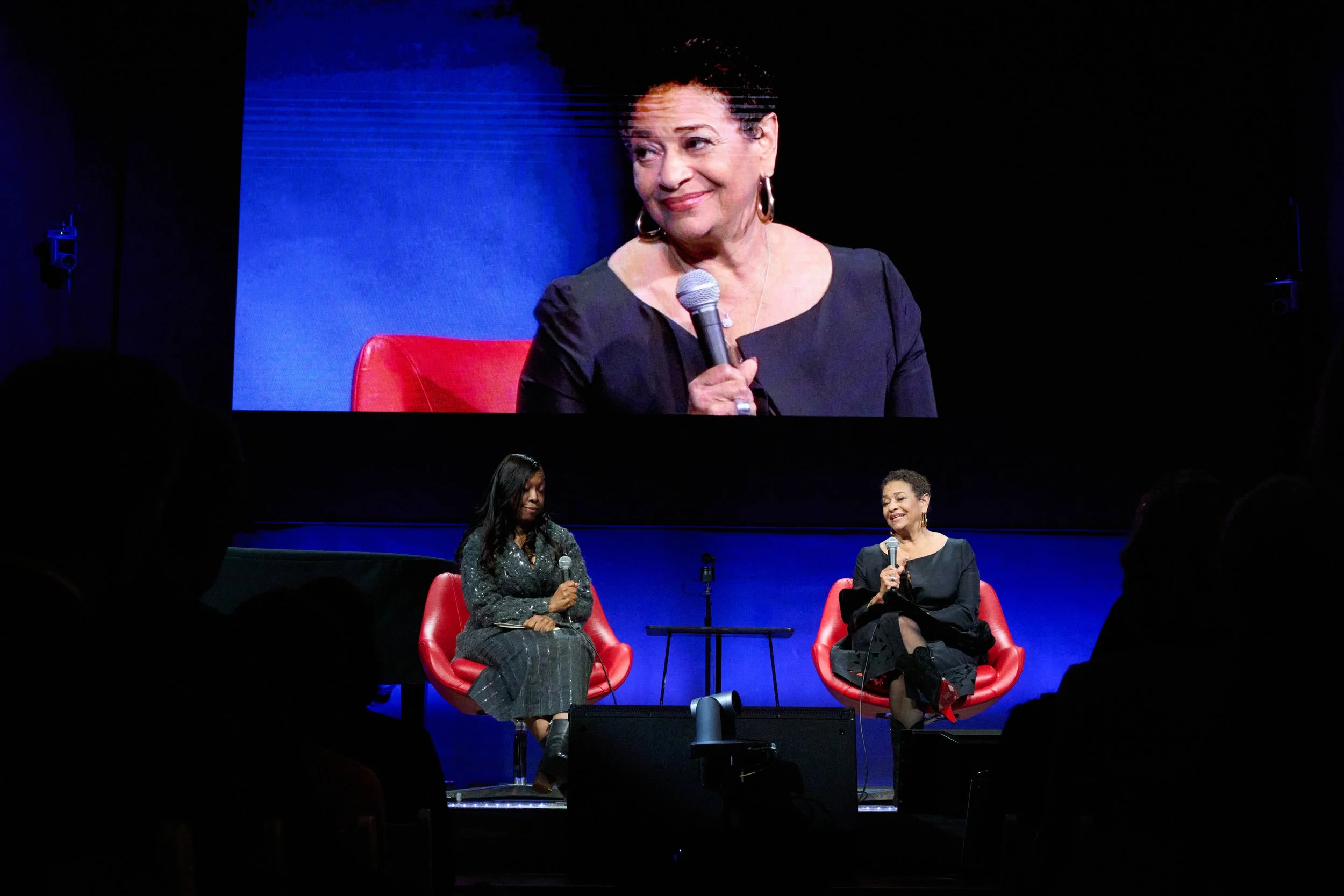 Shonda Rhimes interviews Debbie Allen at the Booked for the Evening fundraiser in Westport CT with event photographer Pamela Einarsen. 
