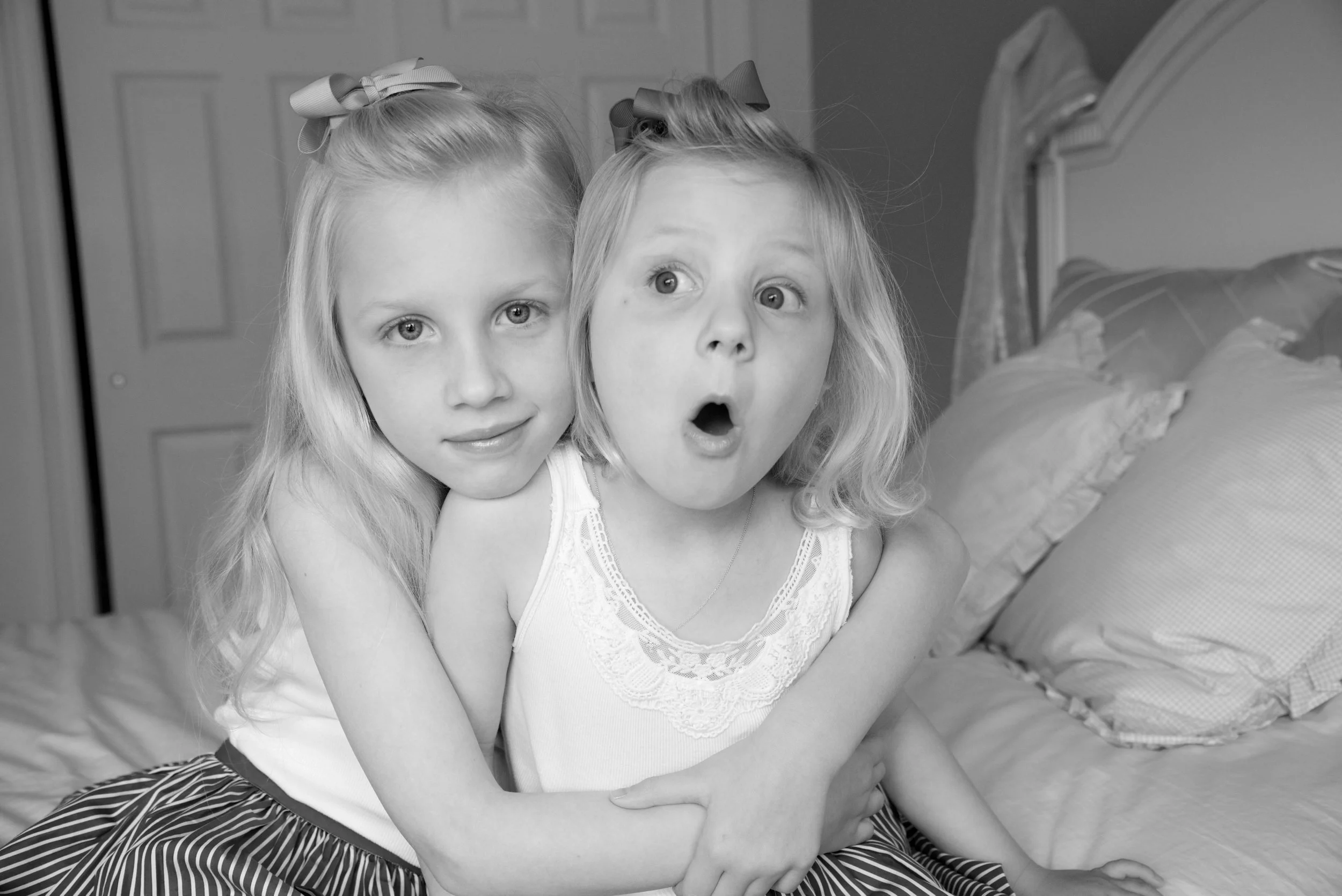 Pamela Einarsen family photo of young girls hugging in their Greenwich CT home
