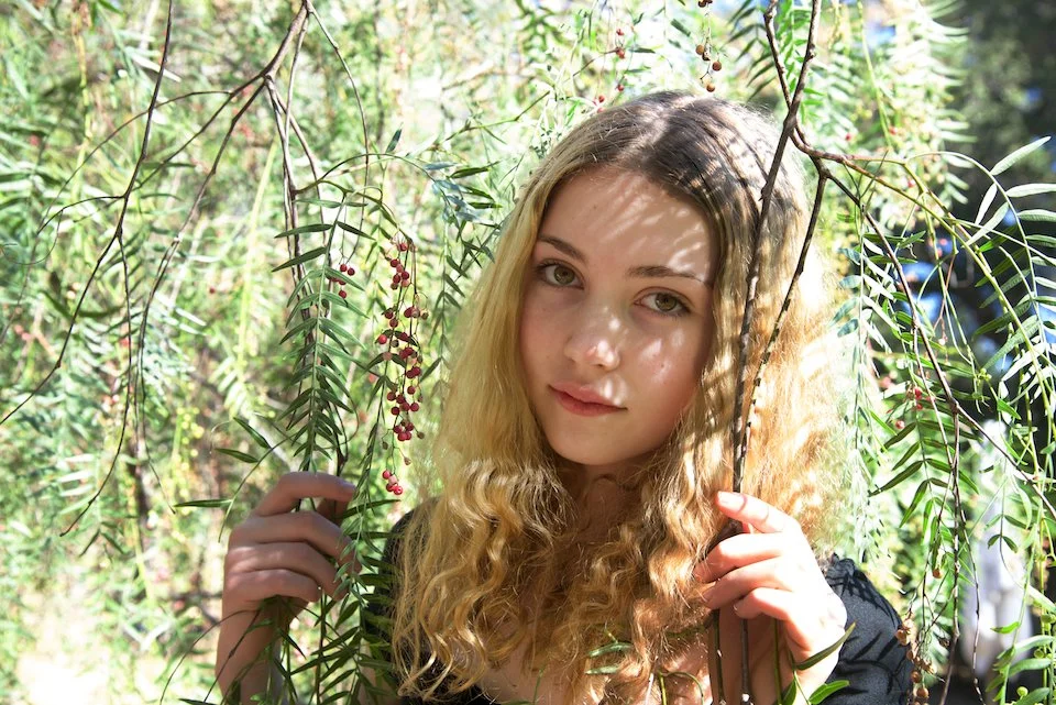 Portrait of girl in a tree in Ojai
