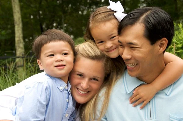 Family hugs in family photographer session in Ridgefield CT