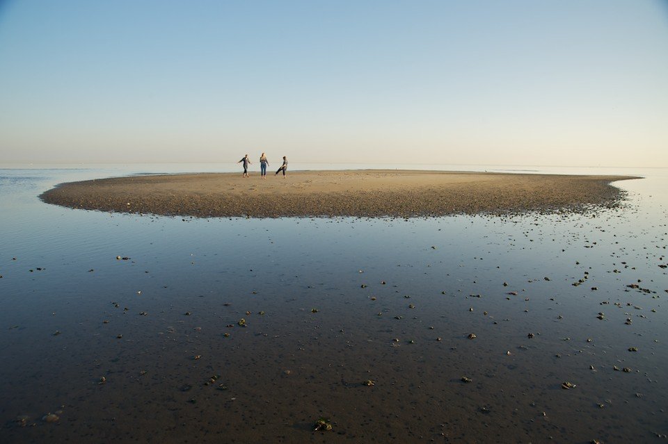 Photographer captures family on the beach near Compo Beach, Westport — one of the towns Pamela Einarsen photographs across Fairfield County