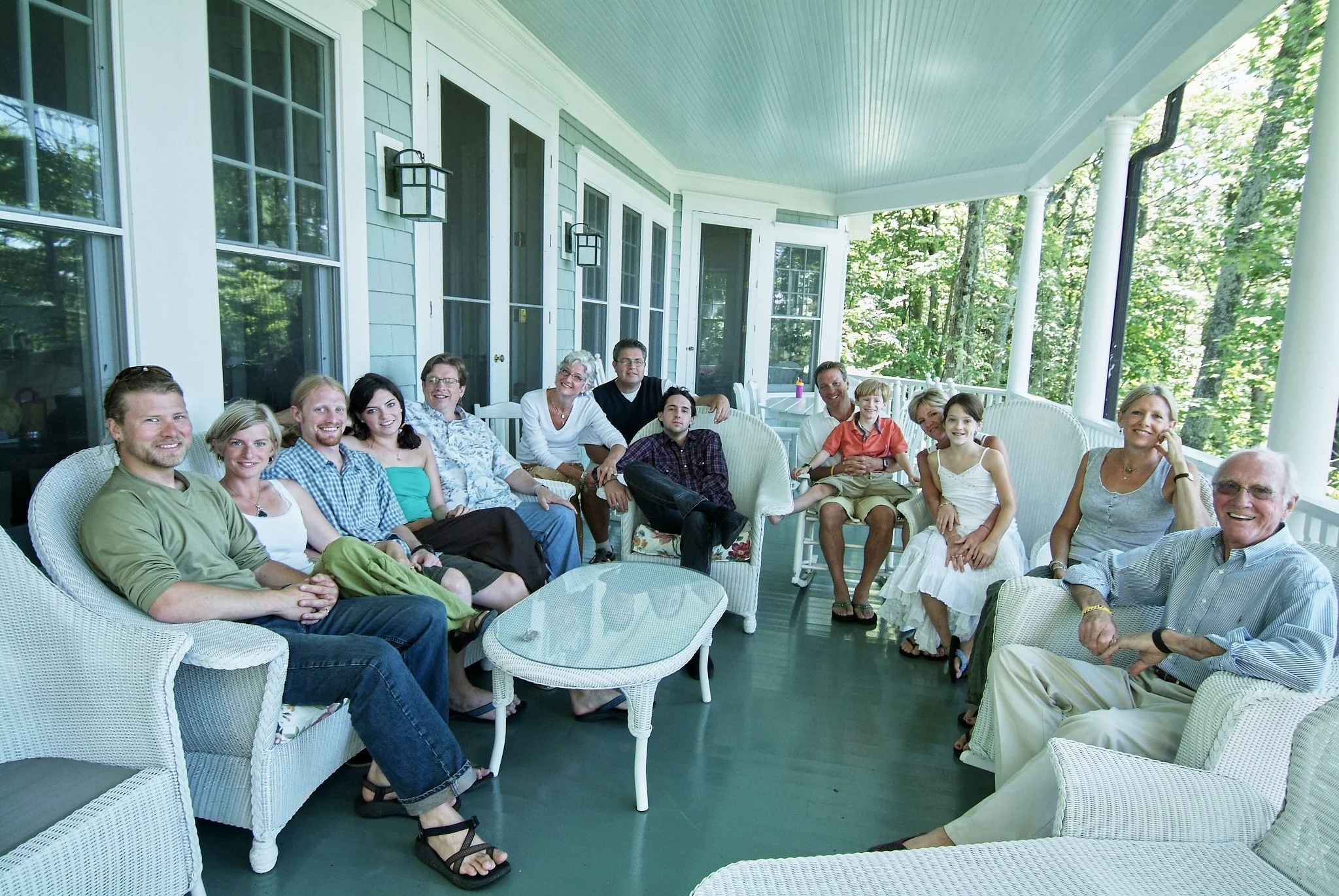Extended family poses on a northern Michigan porch