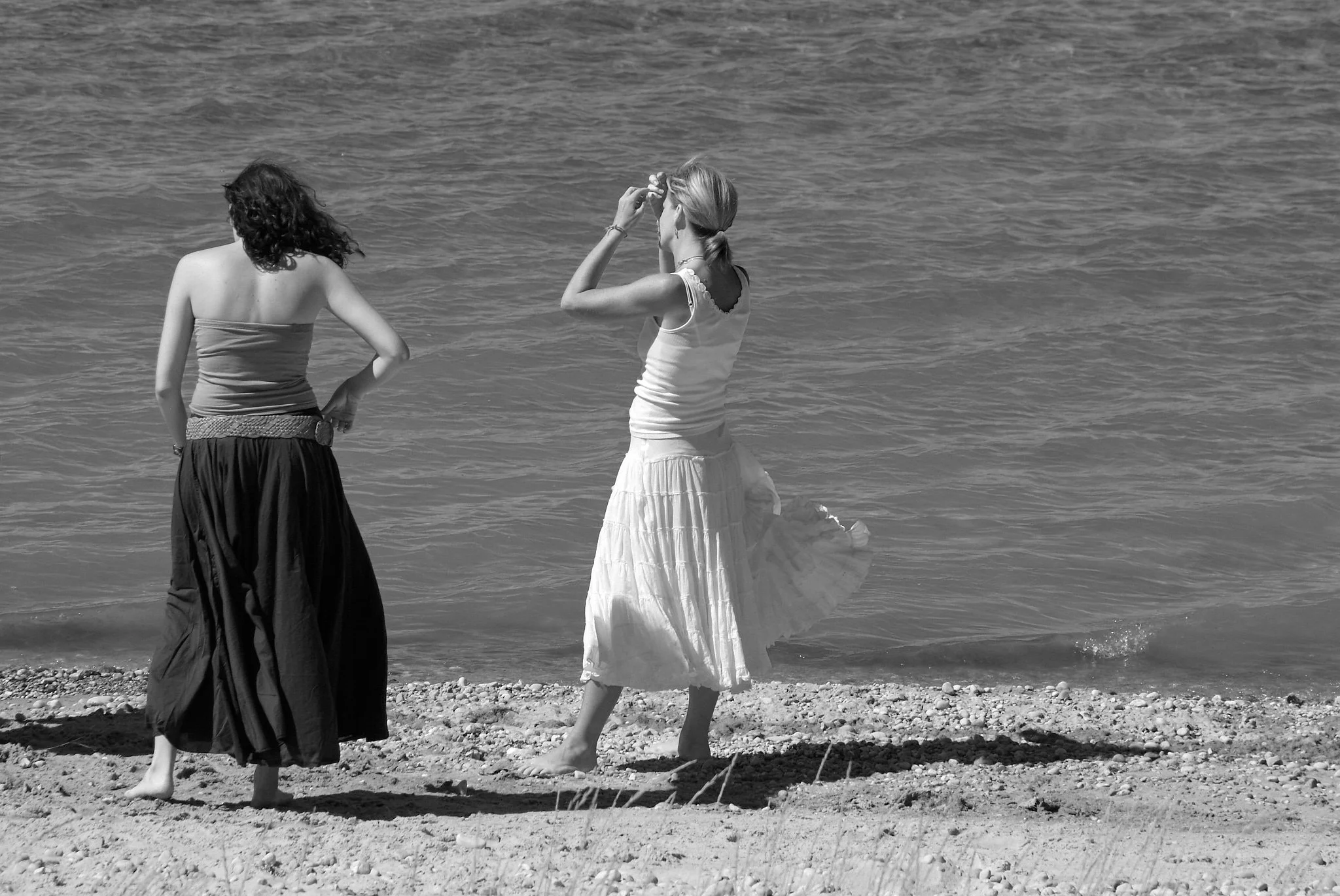 Family relaxes by the water of Lake Michigan near Harbor Springs.