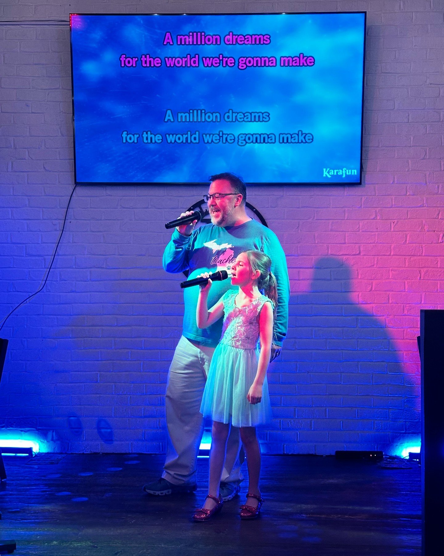 A highlight of our Karaoke Night! That girl's got some pipes &mdash; she takes after her dad. ❤️