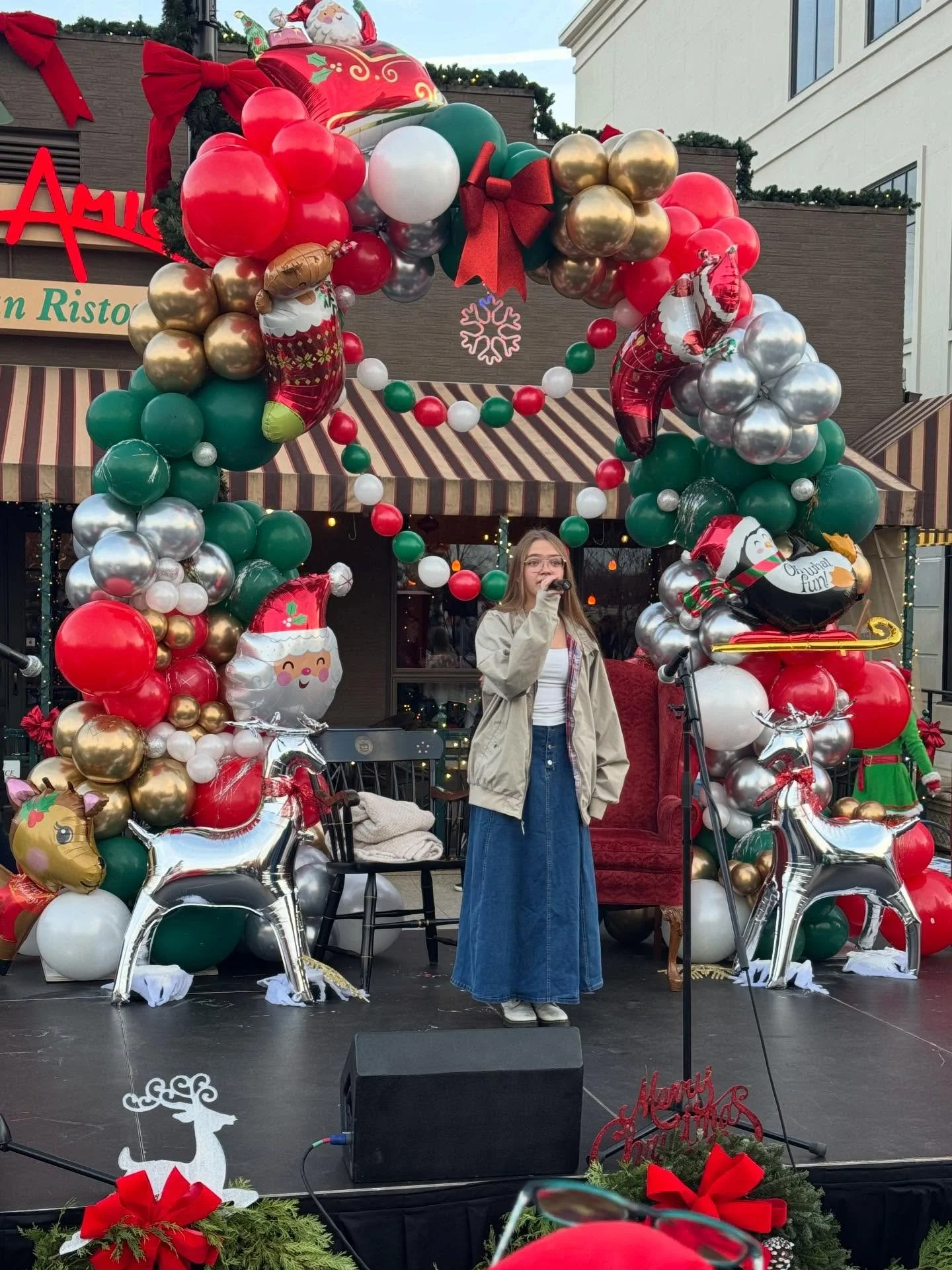 Bailey on stage singing River at Holiday Glow! ⛸️ #solo #brightonmi
