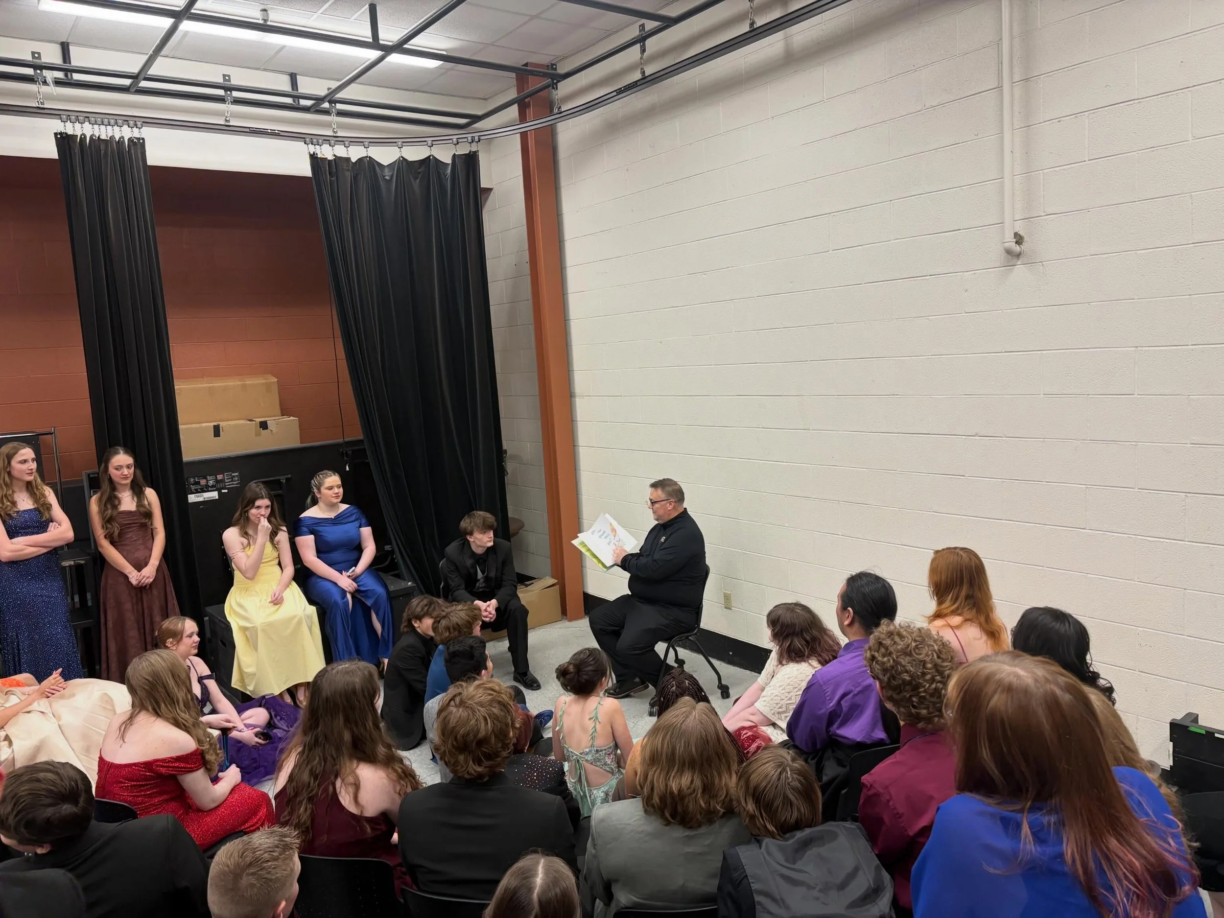PJ&rsquo;s traditional reading of &ldquo;Oh, the Places You&rsquo;ll Go&rdquo; backstage before Spring Spec. 🎓🎶🔮