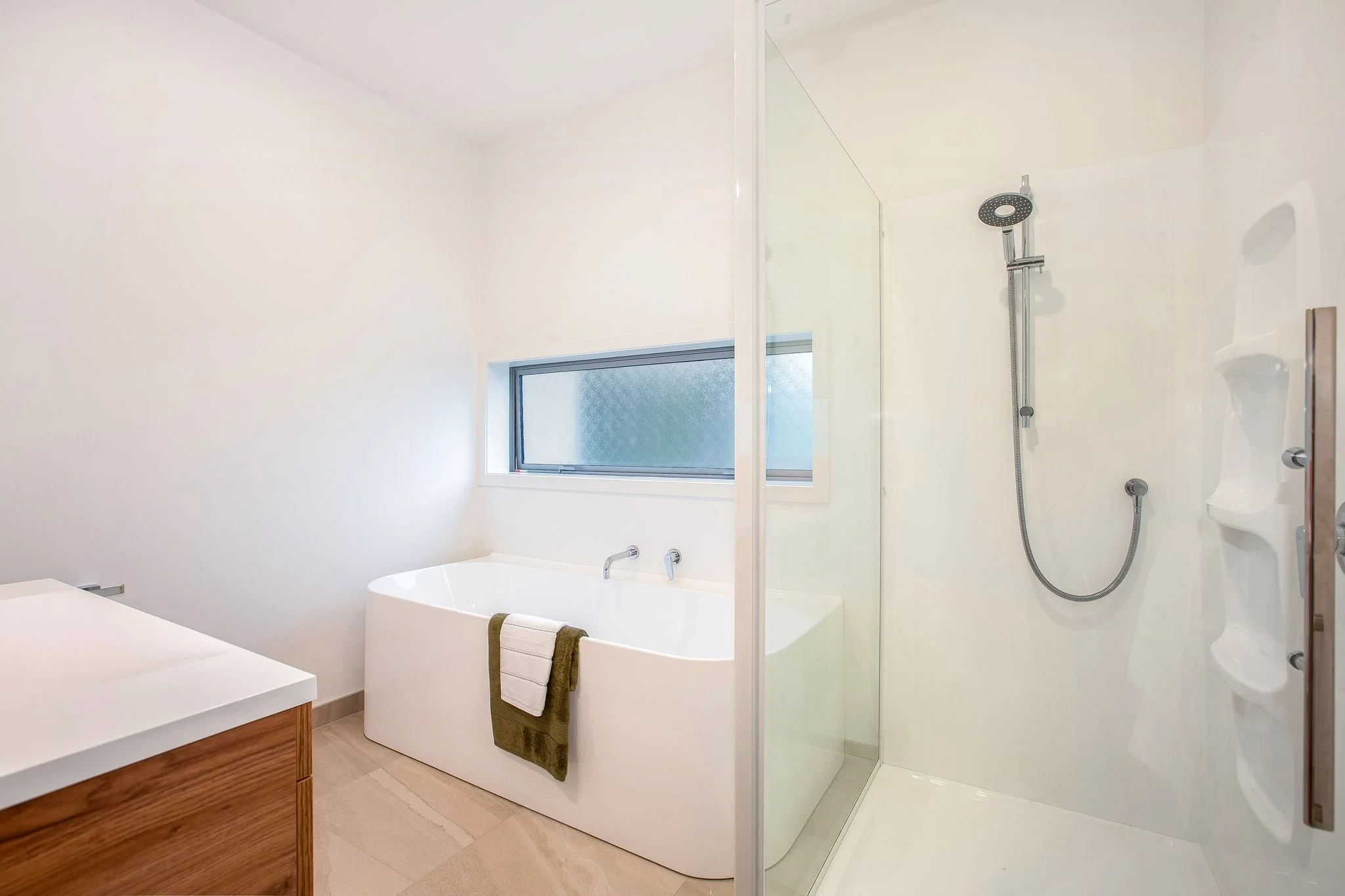 The main bathroom has a luxuriously big bath and large shower.