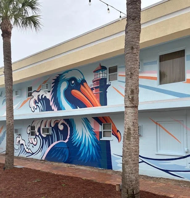 two story tall pelican mural 