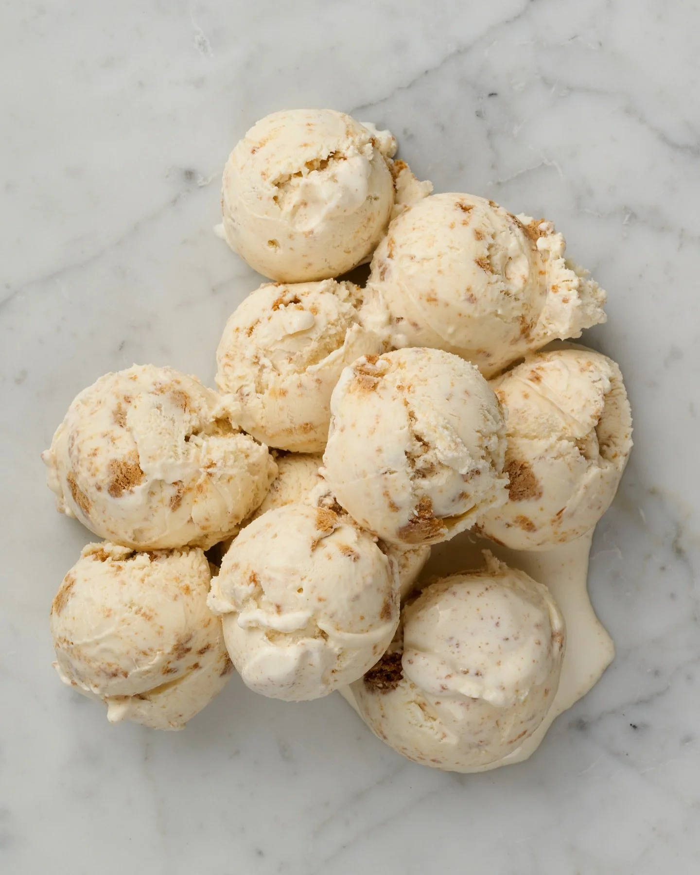 Scoops of McConnell's ice cream on marble background