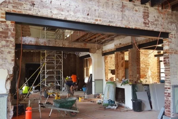 working on internal brick repairs at guildford hotel