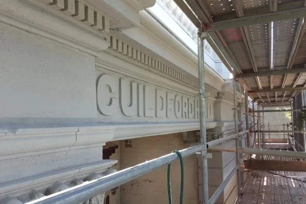 scaffolding on outside of guildford hotel during renovations