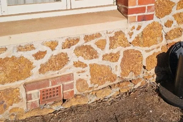 limestone repair needed at base of wall in cottesloe
