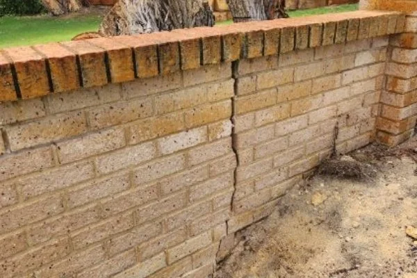 seriously cracked brick wall