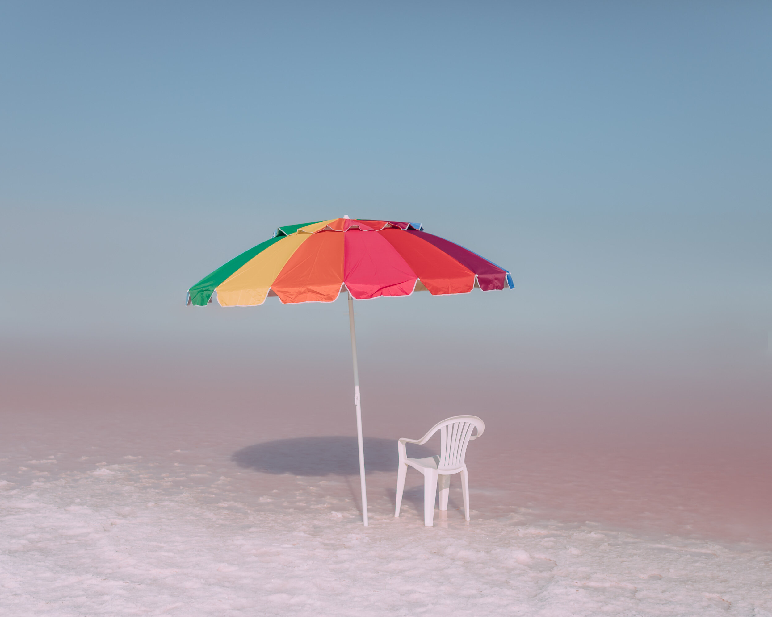 white-chair-rainbow-umbrella-salt-flats.JPG