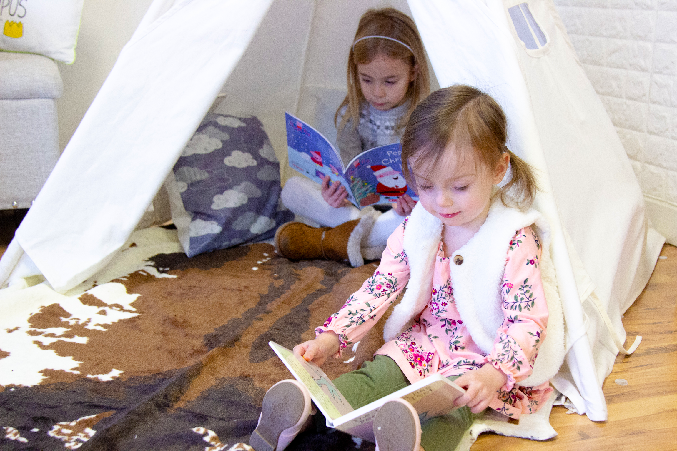 Never too young to pick up a book!