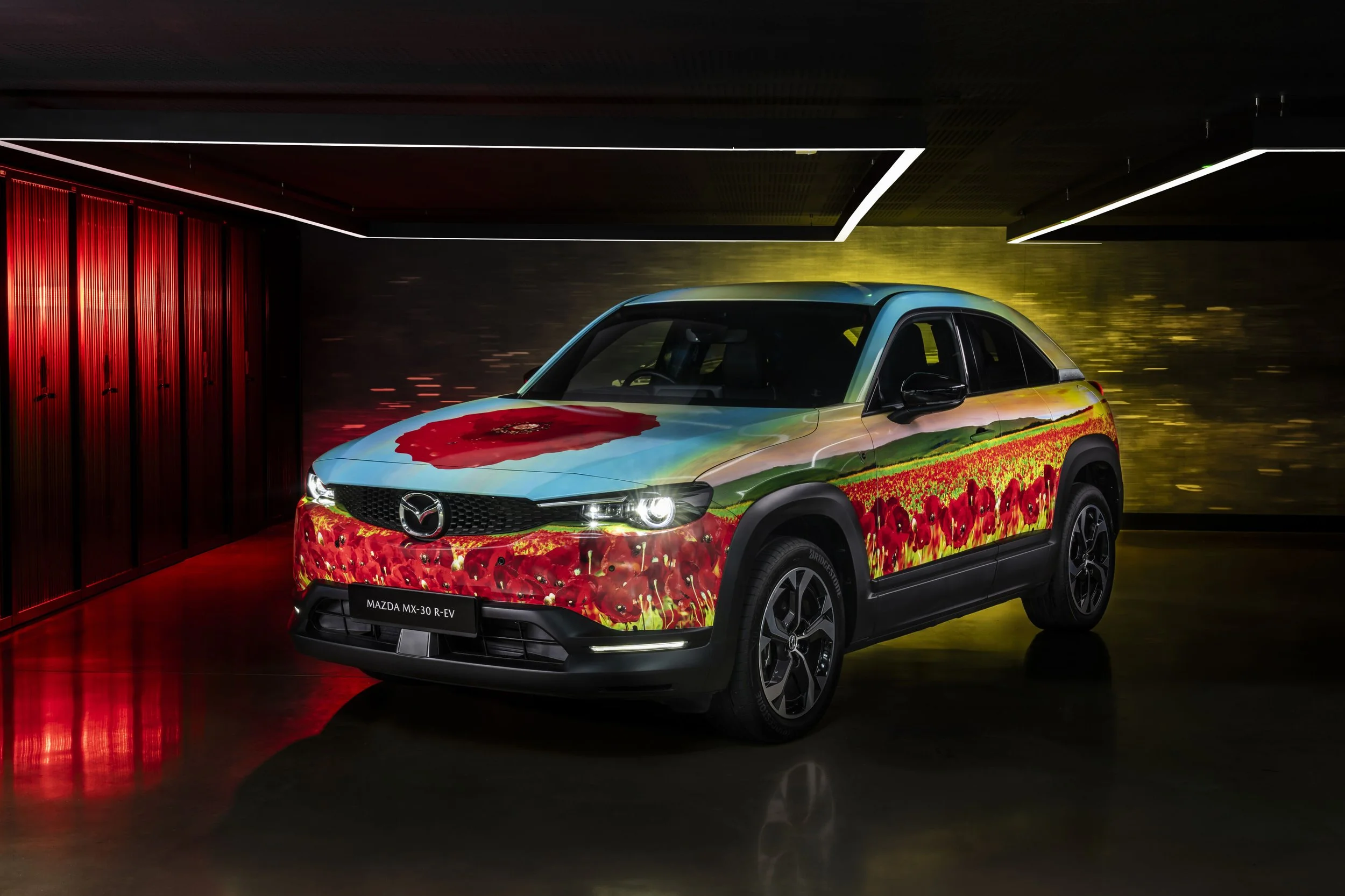 Mazda supports 2024 Race of Remembrance with Mazda MX-30 R-EV course car in unique poppy ‘art car’ livery