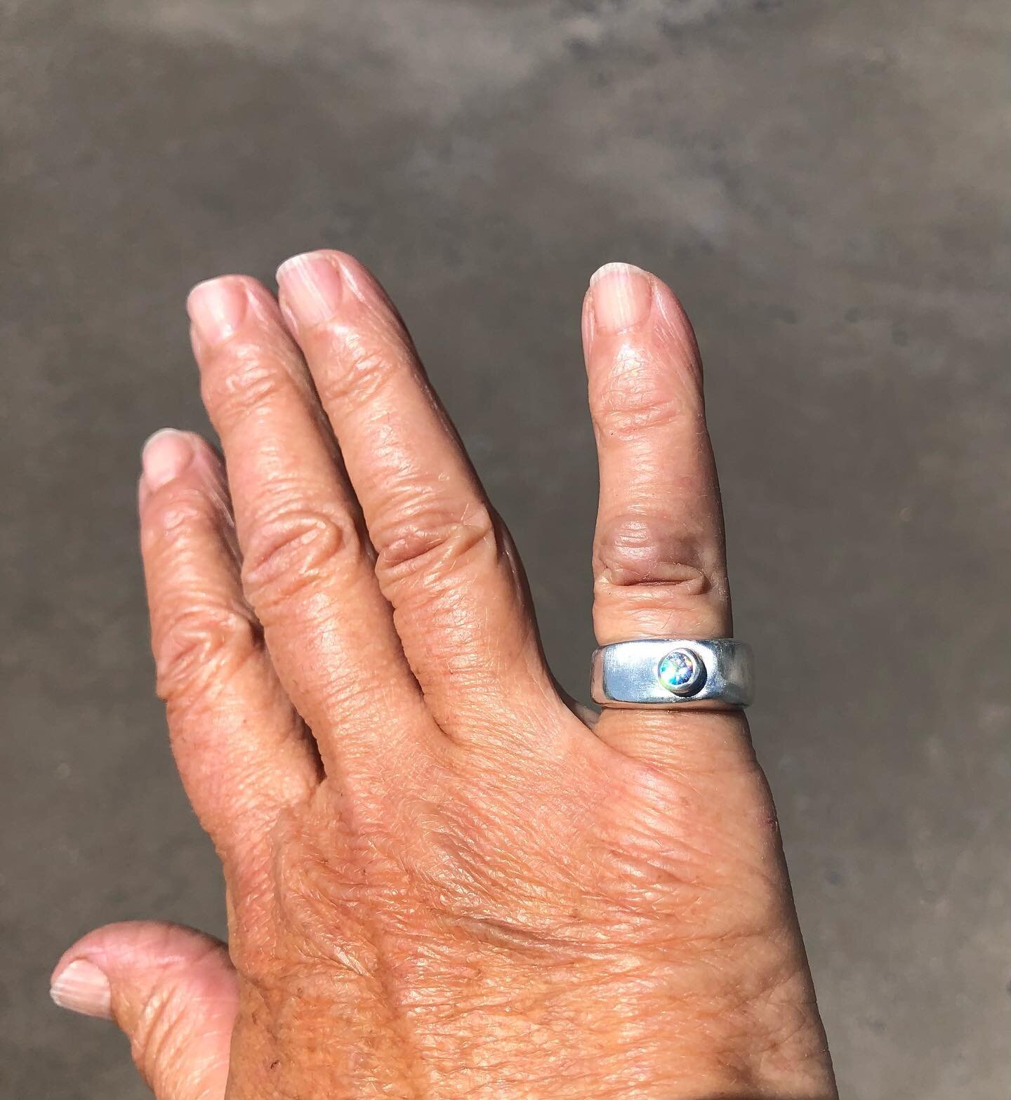 Made a ring for my flawed-knuckle finger. Brushed sterling silver with collet set Swarovski zirconia. Made entirely by hand. The ring has no straight lines and is imperfect. Much like me. #silversmith #artisanjewelry