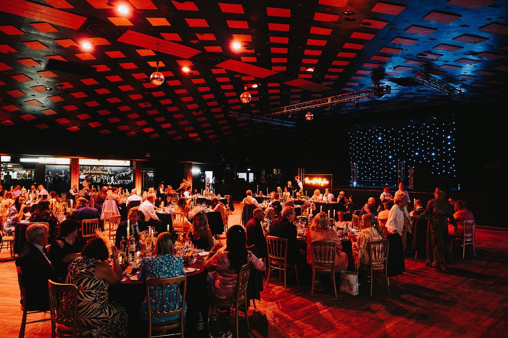 inside barrowlands which is a diy wedding venue scotland during a wedding reception party