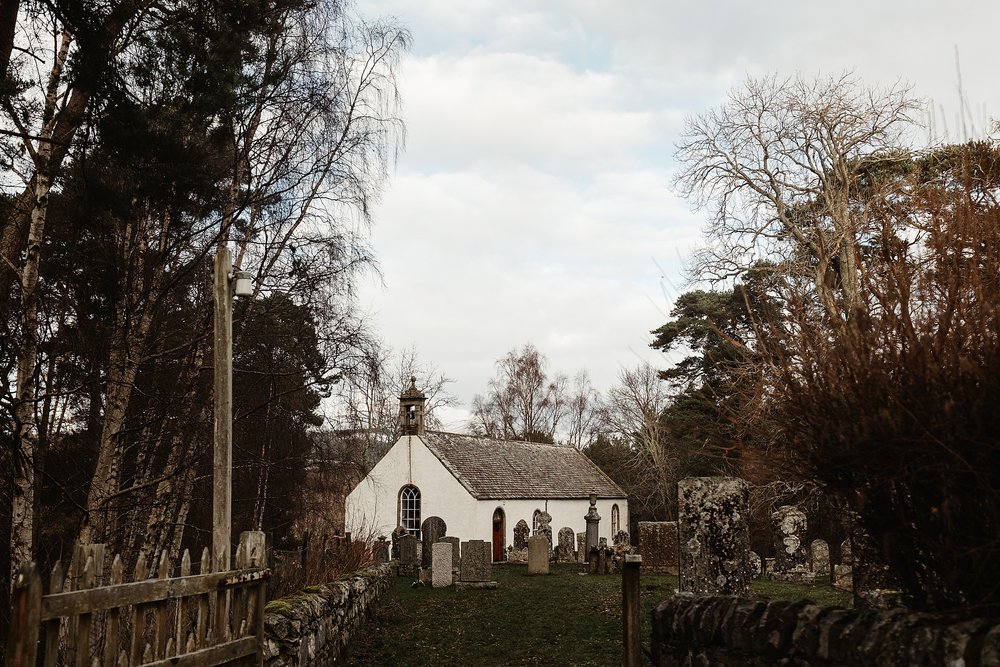 exterior view of Alvie and Insh church on the morning of their elopement by Scottish highlands destination wedding planner
