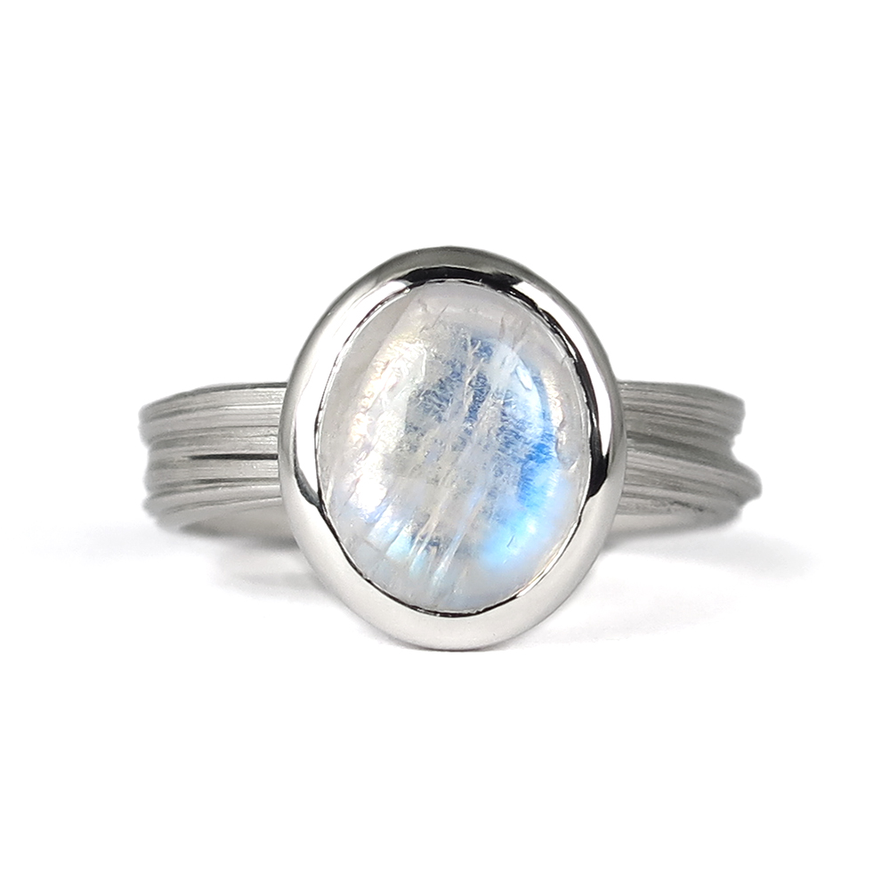 Nathis Moonstone Round Bezel Set Faceted Ring