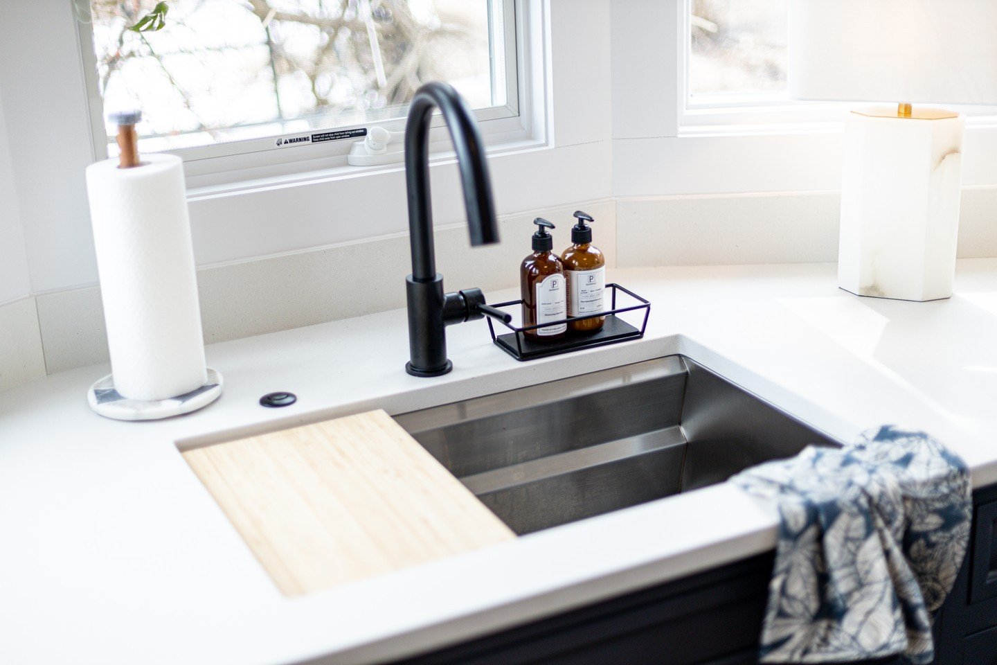 Kitchen workstations are one of the newest trends in kitchen prep areas.

What is this!? It&rsquo;s a sink that fits your accessories like a colander, drying rack, cutting board, and soaking tray within the sink. The sides are beveled and act as a gl