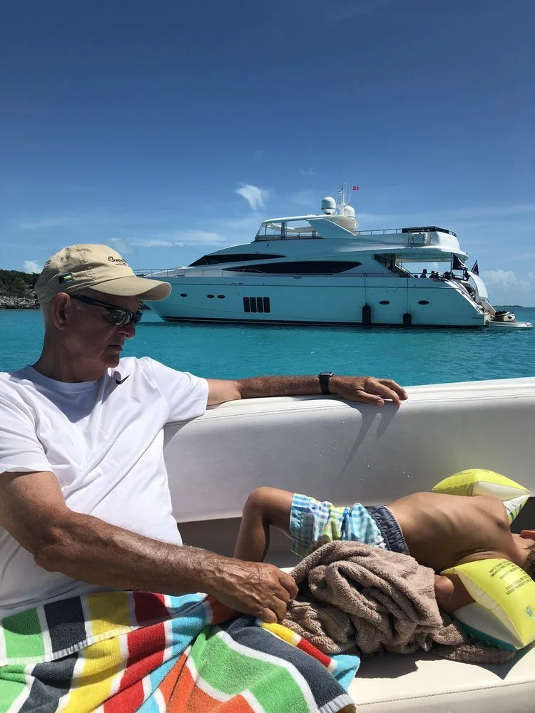 My Dad kept Ryder on the boat to nap while we were snorkeling. No biggie-just an awesome yacht passing by us.