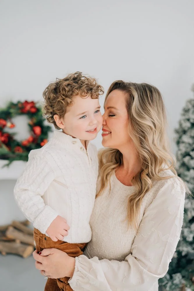 Greenville Christmas Mini Sessions with a Cute Studio Christmas Backdrop with the best photographer