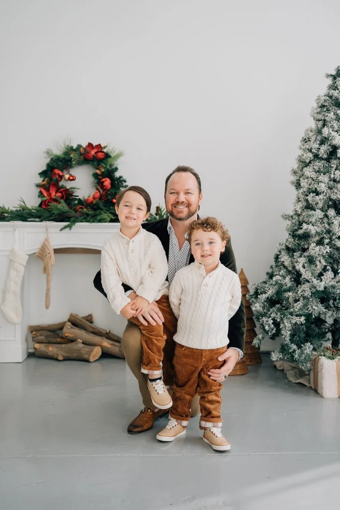 Greenville Christmas Mini Sessions with a Cute Studio Christmas Backdrop with the best photographer