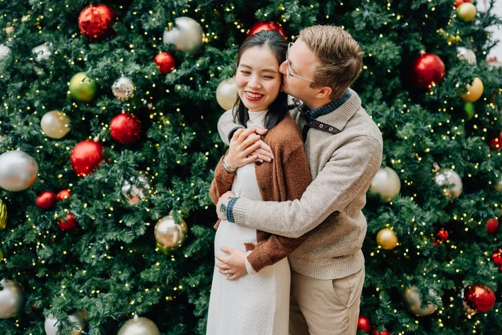  Best Maternity Photographer in Greenville. SC takes Christmas maternity photos in downtown Greenville, SC 