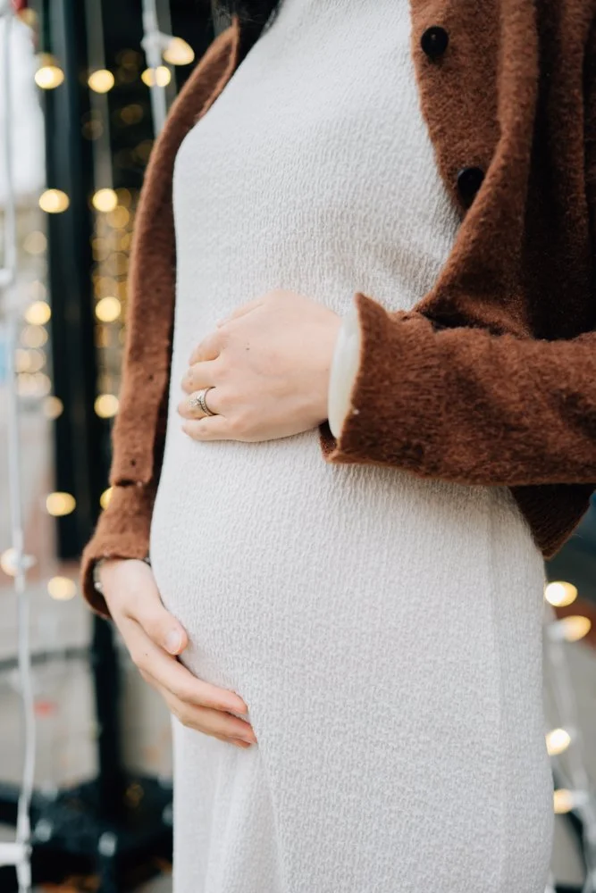  Best Maternity Photographer in Greenville. SC takes Christmas maternity photos in downtown Greenville, SC 