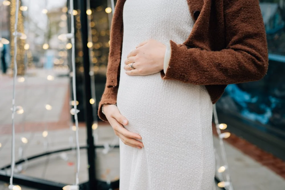 Christmas Maternity Photos in Downtown Greenville, SC