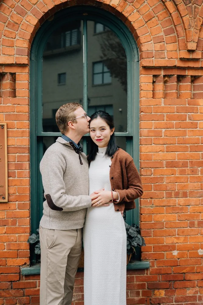  Best Maternity Photographer in Greenville. SC takes Christmas maternity photos in downtown Greenville, SC 