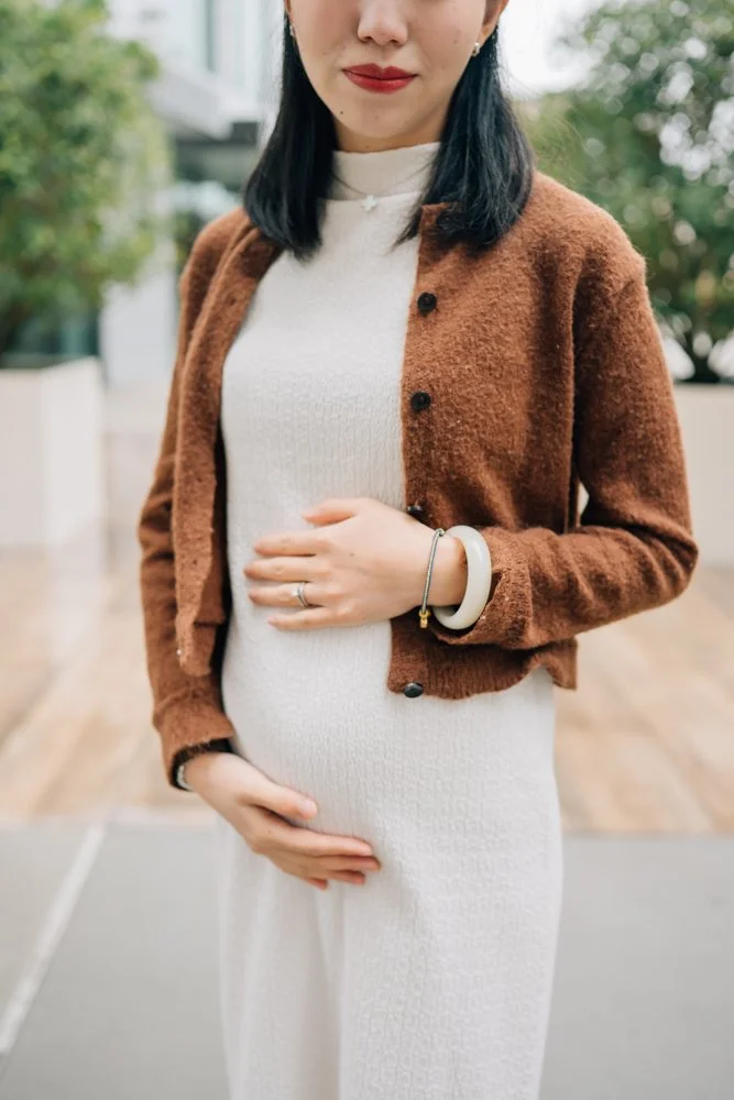  Best Maternity Photographer in Greenville. SC takes Christmas maternity photos in downtown Greenville, SC 