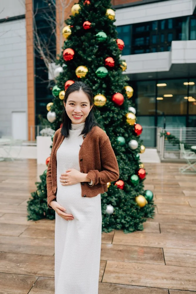  Best Maternity Photographer in Greenville. SC takes Christmas maternity photos in downtown Greenville, SC 