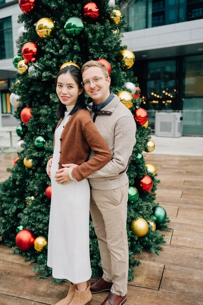  Best Maternity Photographer in Greenville. SC takes Christmas maternity photos in downtown Greenville, SC 
