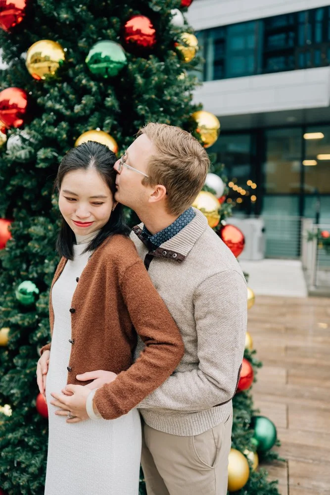  Best Maternity Photographer in Greenville. SC takes Christmas maternity photos in downtown Greenville, SC 