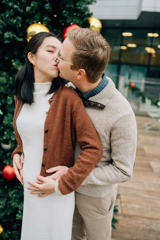  Best Maternity Photographer in Greenville. SC takes Christmas maternity photos in downtown Greenville, SC 