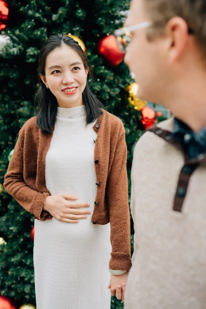  Best Maternity Photographer in Greenville. SC takes Christmas maternity photos in downtown Greenville, SC 
