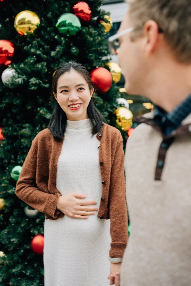  Best Maternity Photographer in Greenville. SC takes Christmas maternity photos in downtown Greenville, SC 