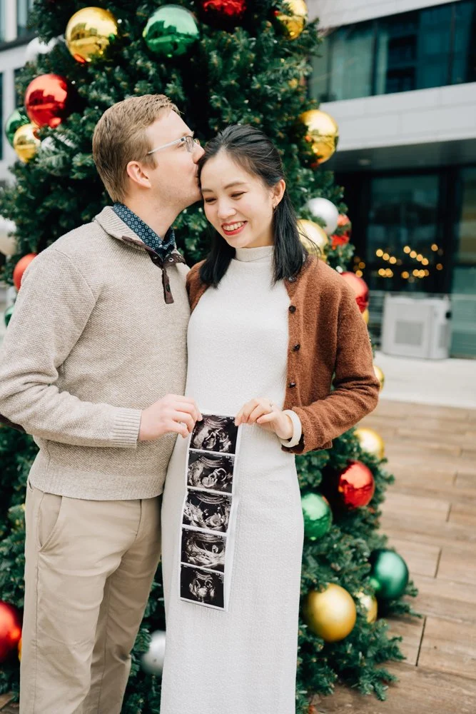  Best Maternity Photographer in Greenville. SC takes Christmas maternity photos in downtown Greenville, SC 